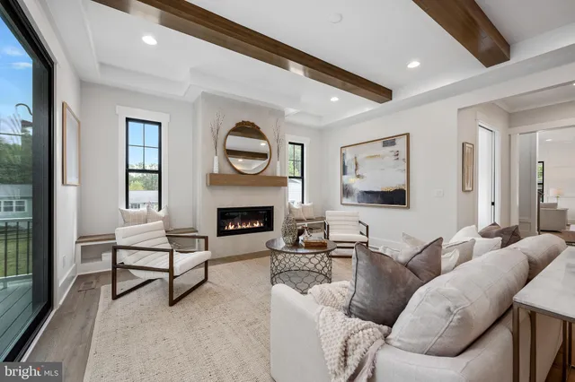 a spacious bathroom with a granite countertop sink mirror and shower