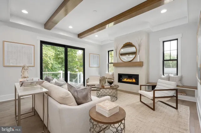 a bathroom with double vanity sinks and a mirror