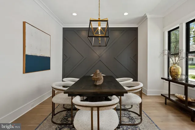 a bathroom with a granite countertop bathtub shower sink vanity and toilet