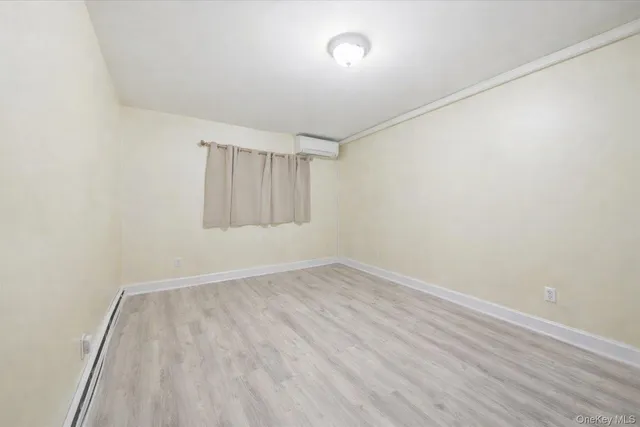 a bedroom with a bed and a table