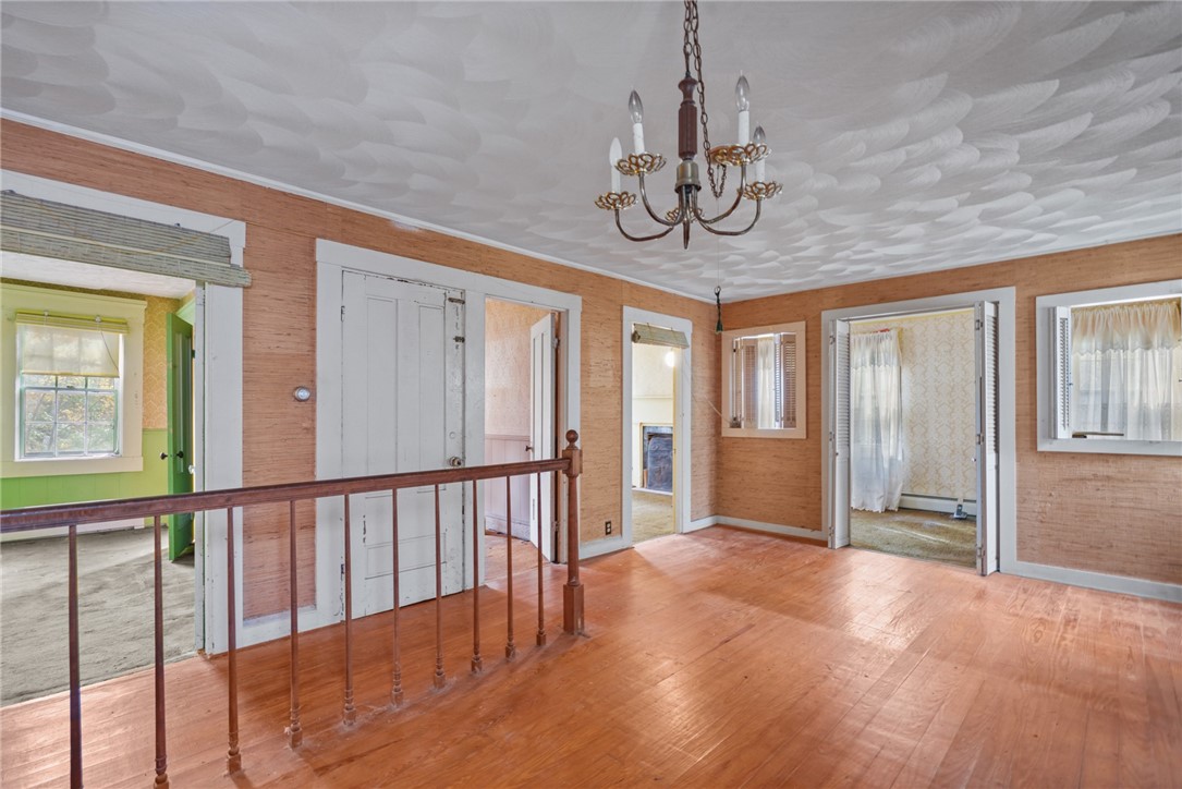 2145 Division Road East Greenwich, RI 02818 - Photo 11 of 46 Dining area with beautiful hardwood floors