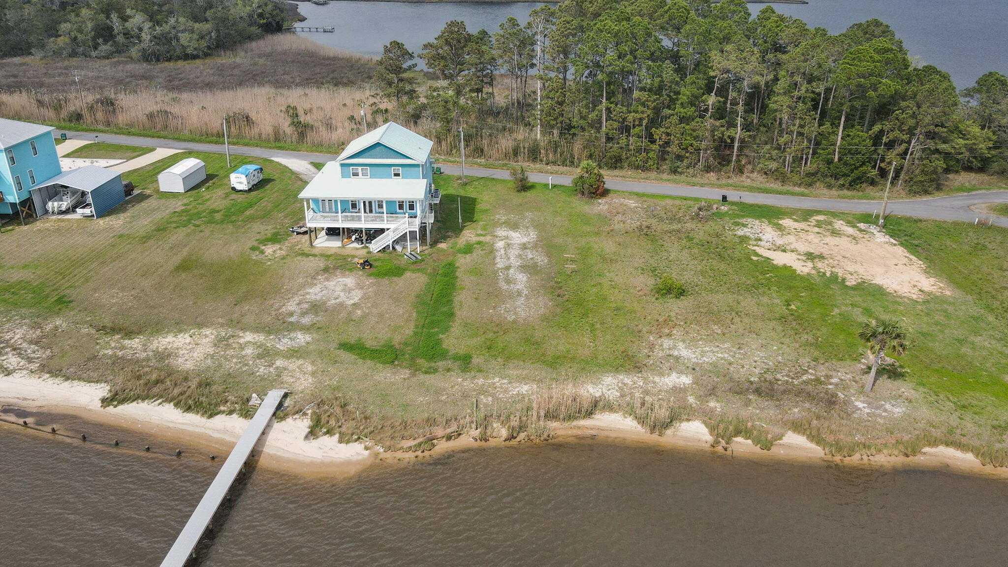 554 Beatrice Point Road Freeport, FL 32439 - Photo 2 of 22 a view of a house with a yard