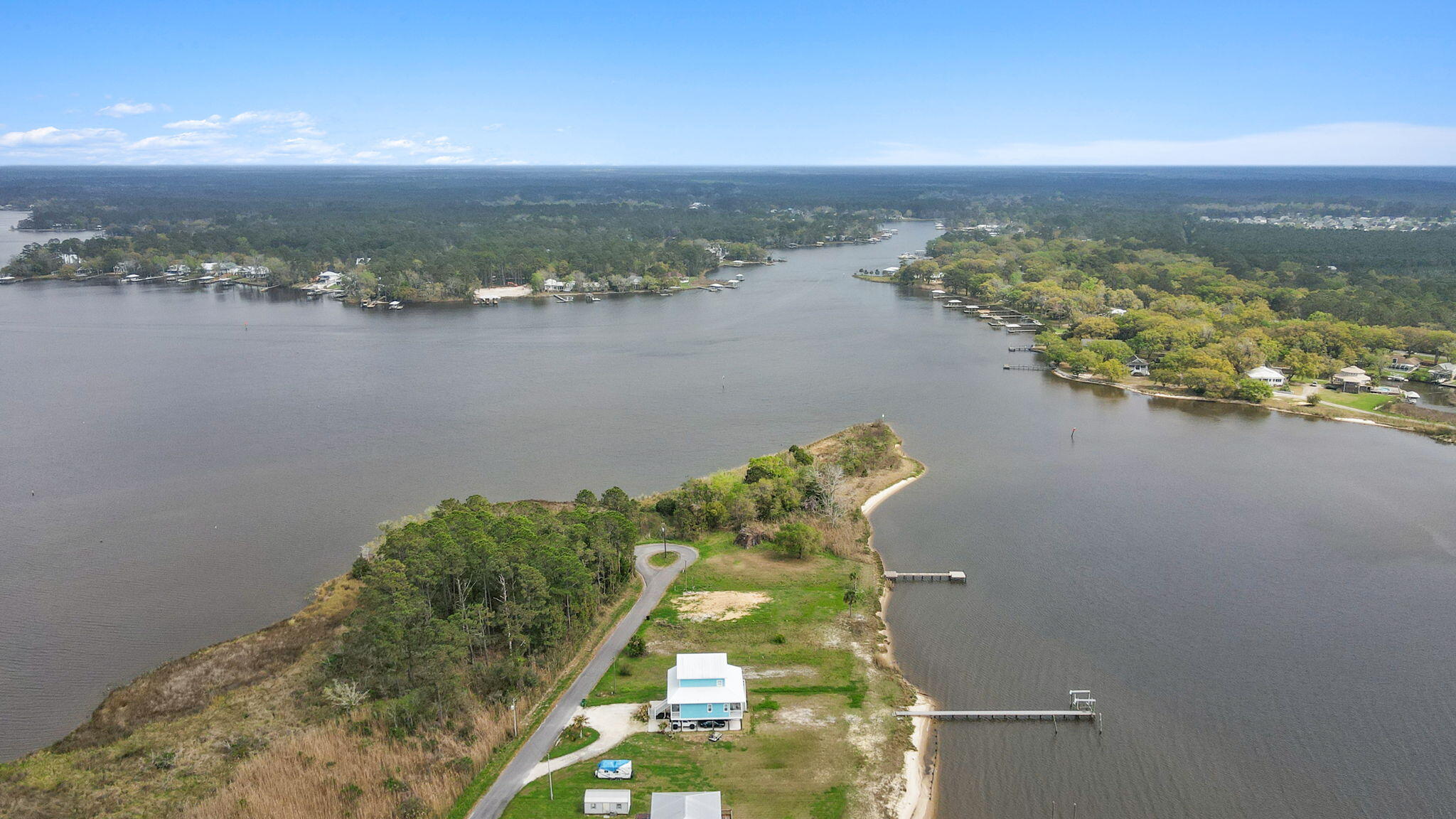 554 Beatrice Point Road Freeport, FL 32439 - Photo 6 of 22 a view of a lake with a city