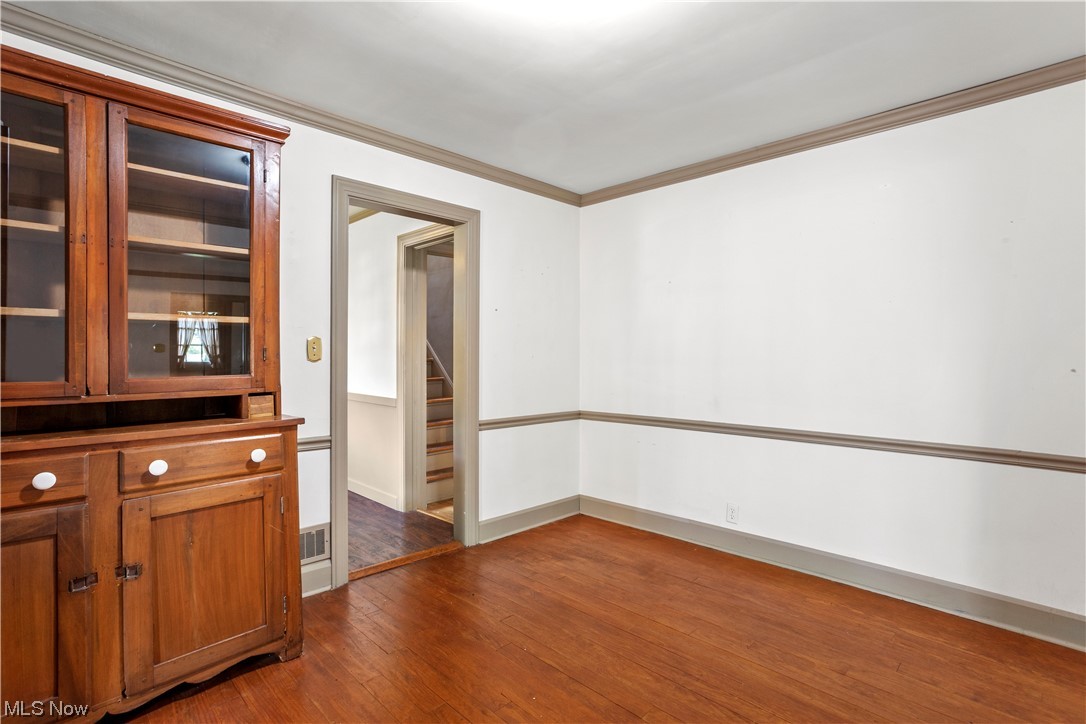 1920 Grafton Road Elyria, OH 44035 - Photo 6 of 35 Crown molding and chair rails in the formal dining and living rooms