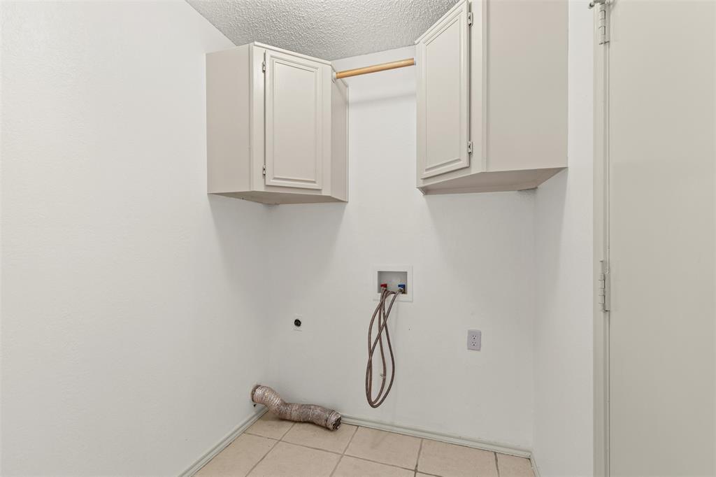 1013 Mockingbird Drive Grapevine, TX 76051 - Photo 15 of 26 a bathroom with a shower