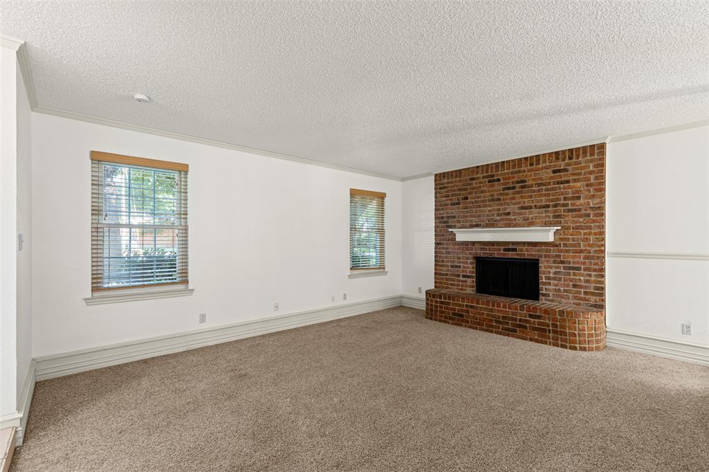 1013 Mockingbird Drive Grapevine, TX 76051 - Photo 7 of 26 an empty room with windows