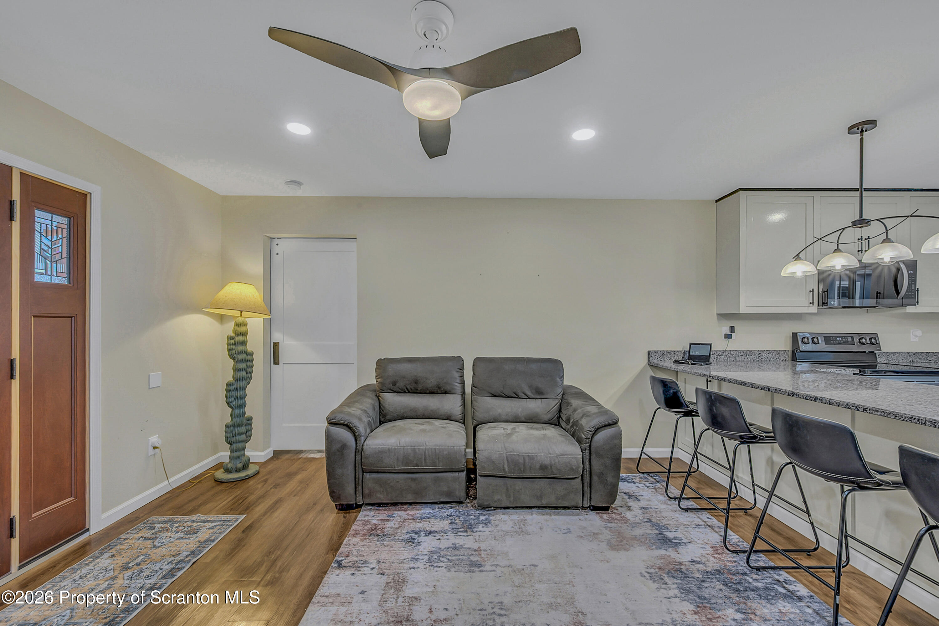 8 Hermel Street Scott Township, PA 18447 - Photo 14 of 38 a living room with furniture and wooden floor