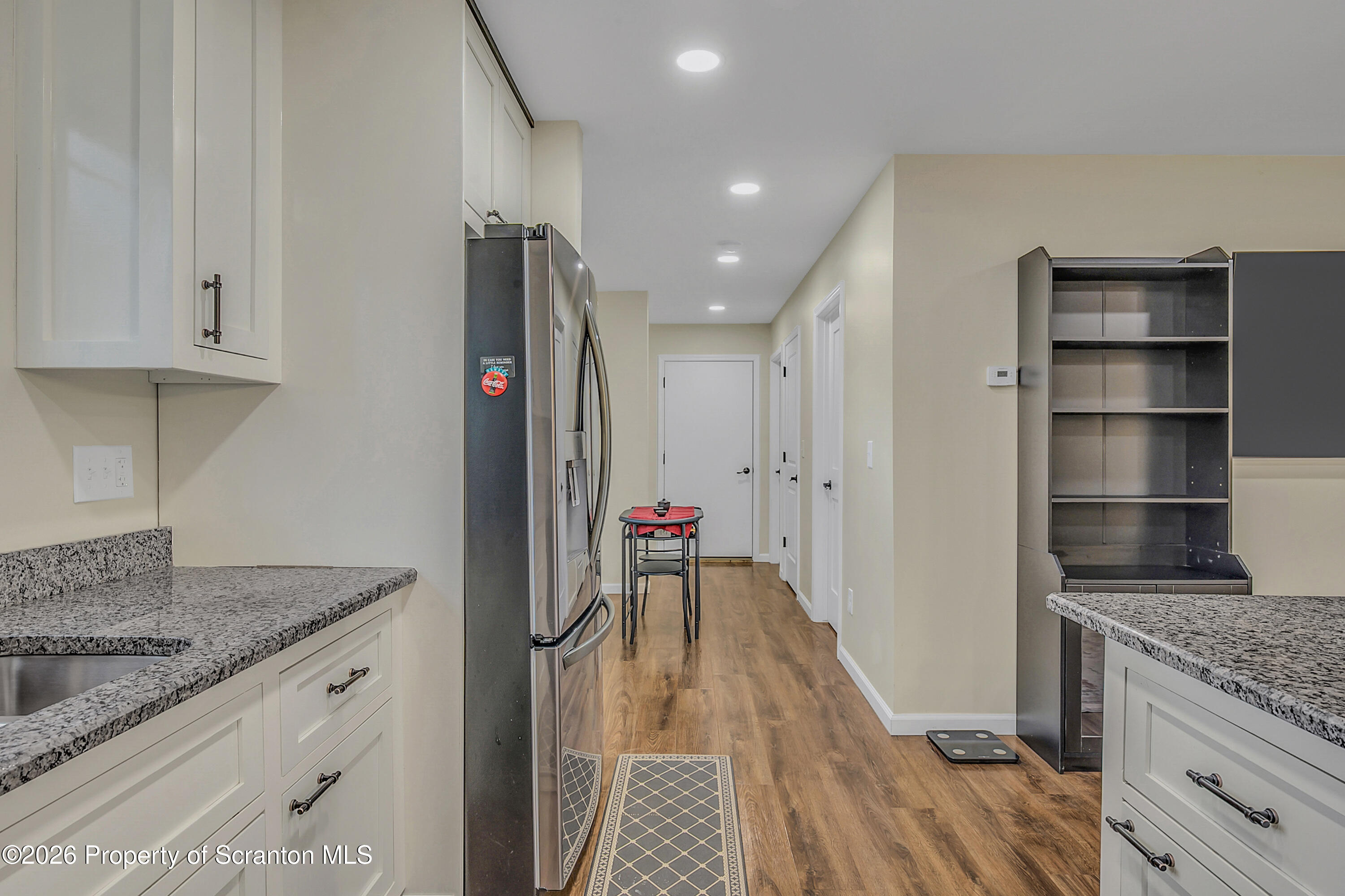 8 Hermel Street Scott Township, PA 18447 - Photo 19 of 38 a kitchen with stainless steel appliances granite countertop a refrigerator and a sink
