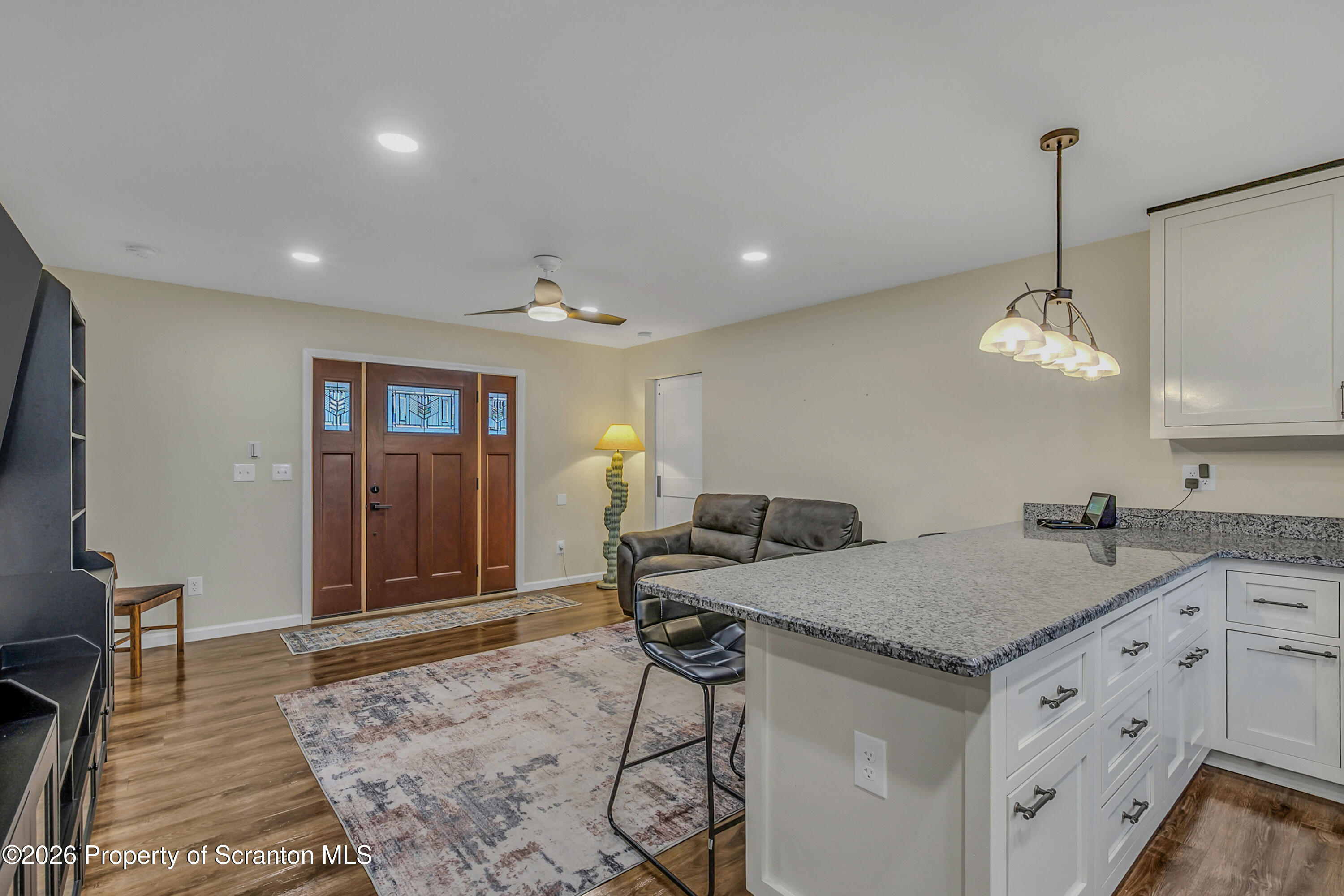 8 Hermel Street Scott Township, PA 18447 - Photo 20 of 38 a view of a center island and chandelier