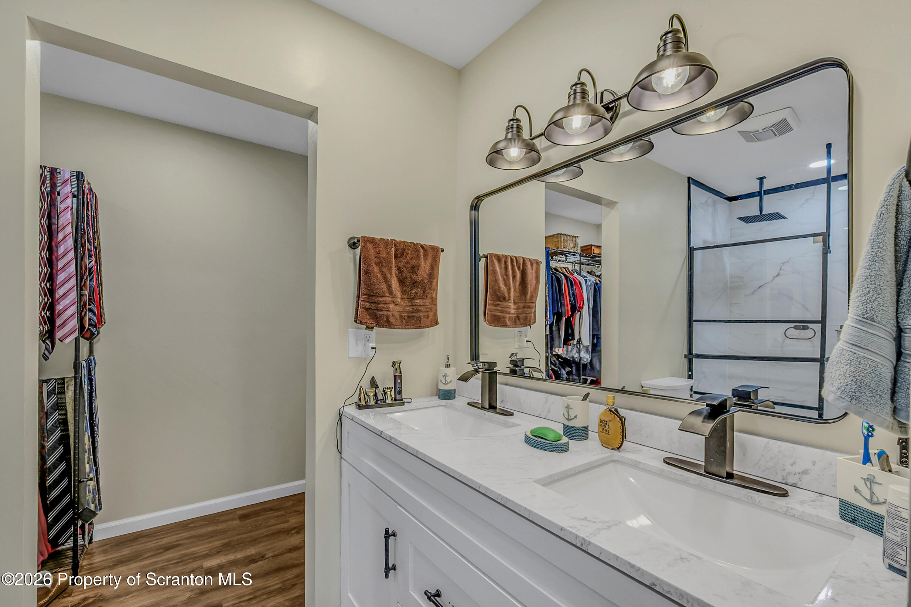 8 Hermel Street Scott Township, PA 18447 - Photo 26 of 38 a bathroom with a sink and a mirror