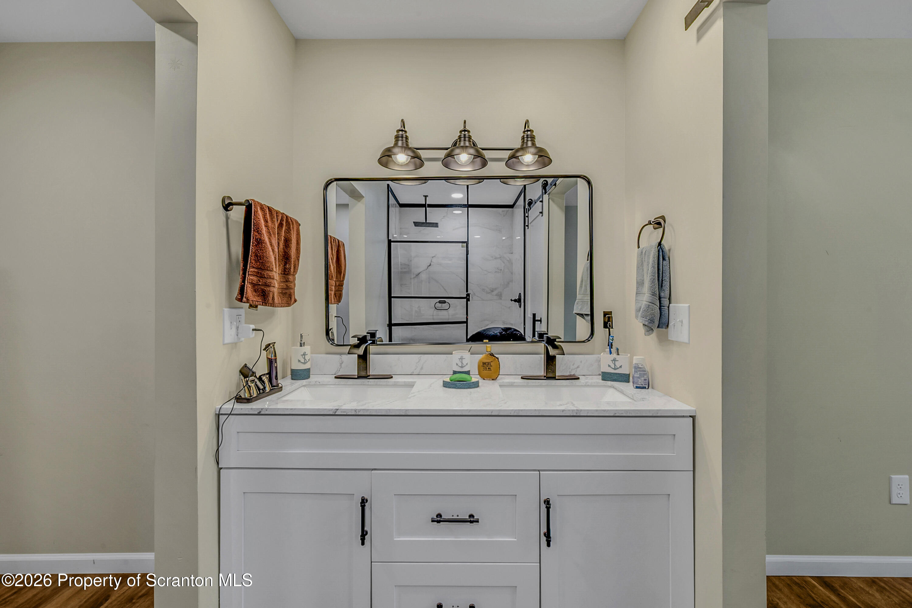 8 Hermel Street Scott Township, PA 18447 - Photo 27 of 38 a bathroom with a sink and a mirror
