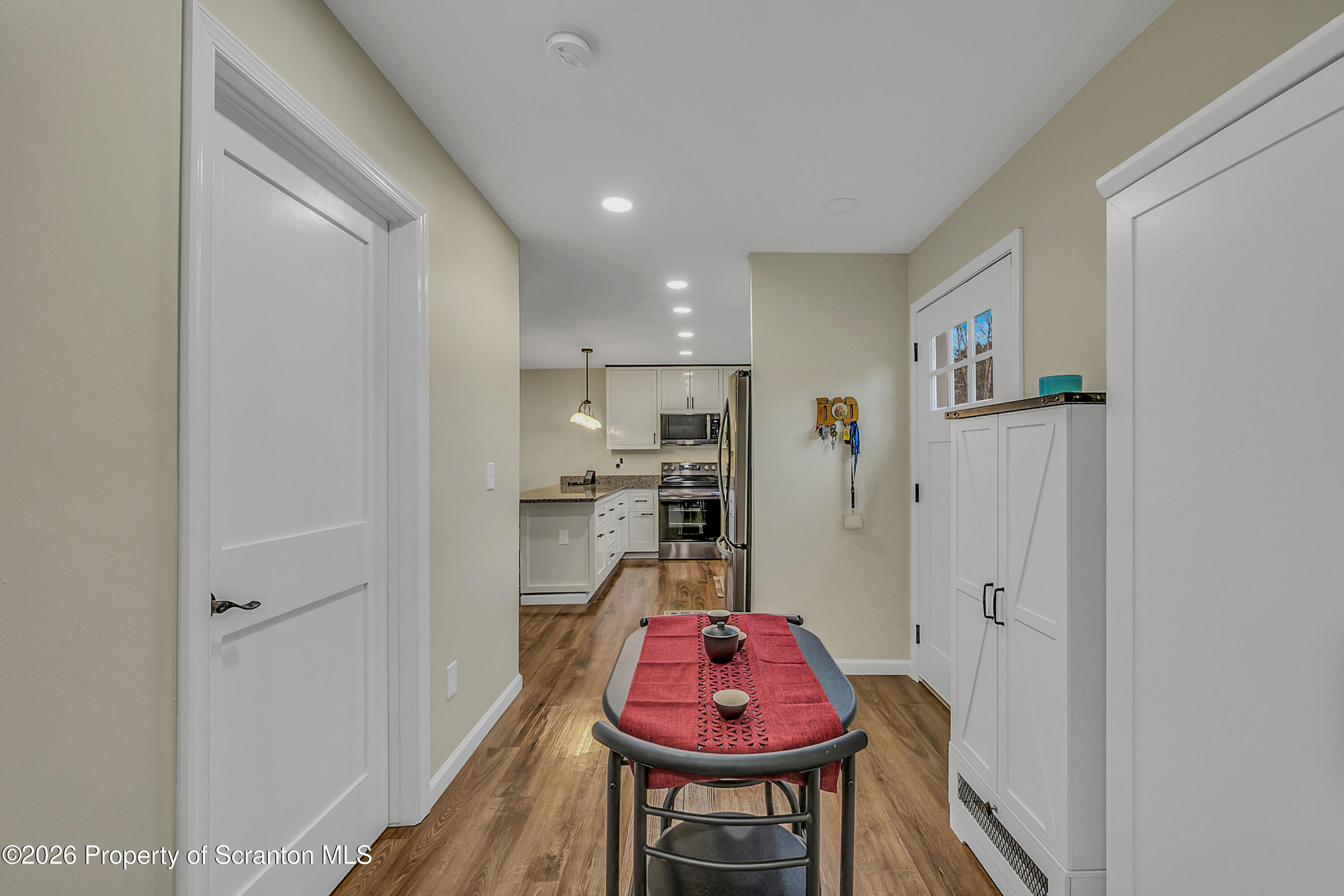 8 Hermel Street Scott Township, PA 18447 - Photo 33 of 38 a kitchen with a refrigerator and a wooden cabinets