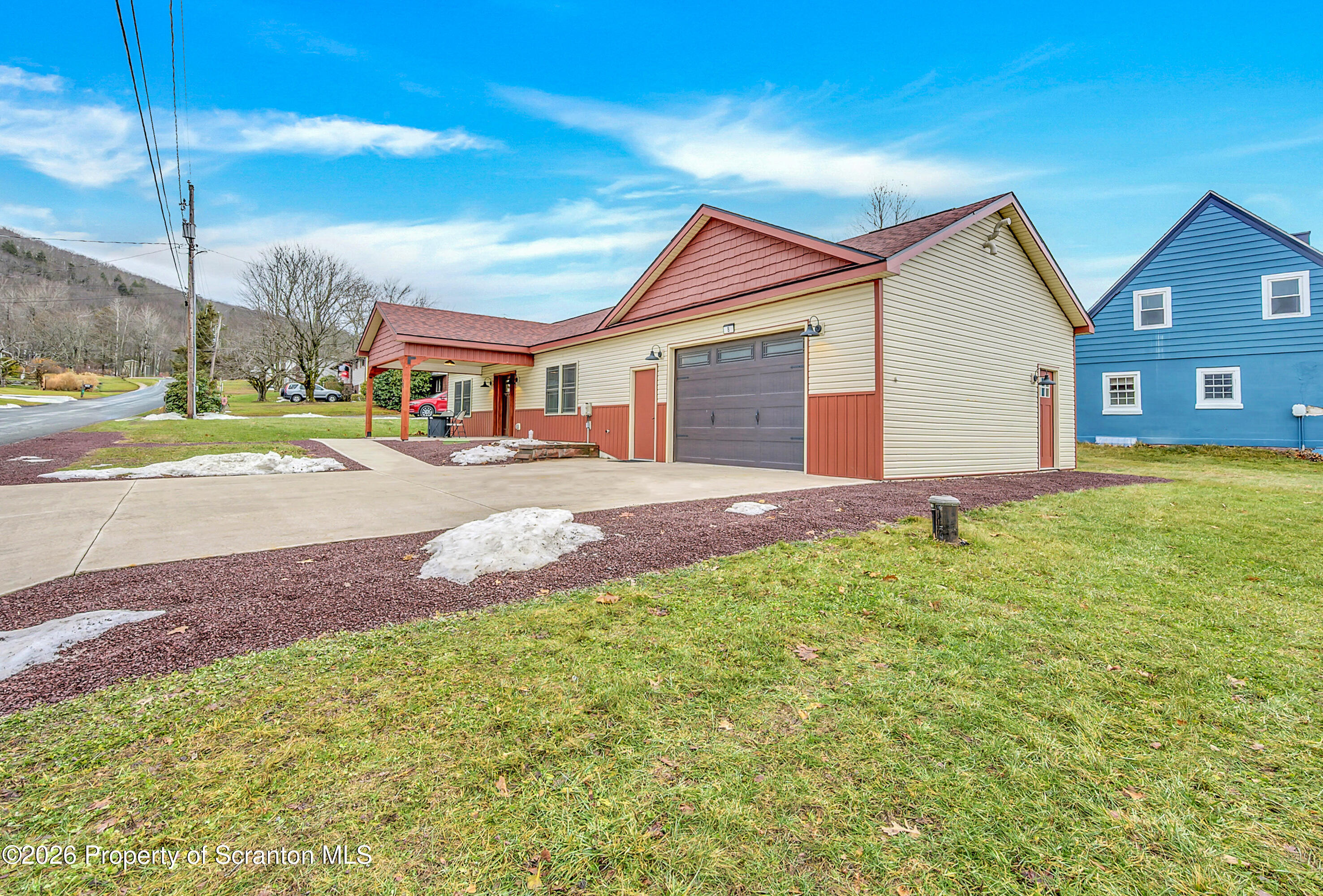 8 Hermel Street Scott Township, PA 18447 - Photo 9 of 38 a front view of house with yard and trees in the background