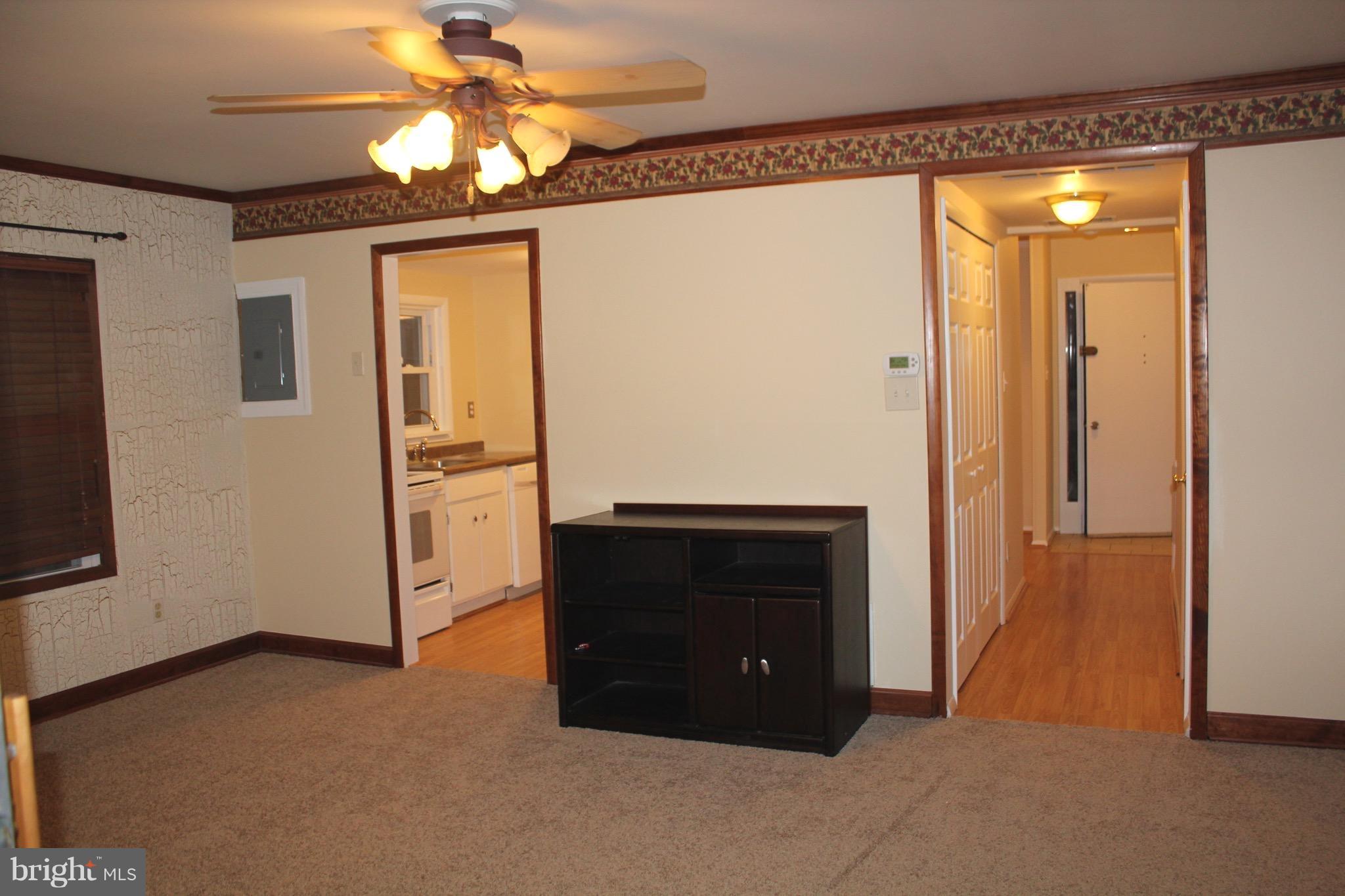 157 Dunlap Road Pasadena, MD 21122 - Photo 22 of 29 Living Room w/New Carpet & Paint