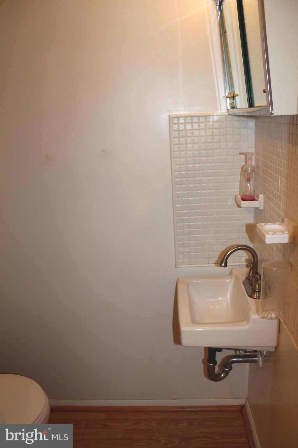 157 Dunlap Road Pasadena, MD 21122 - Photo 23 of 29 Main Level 1/2 Bath