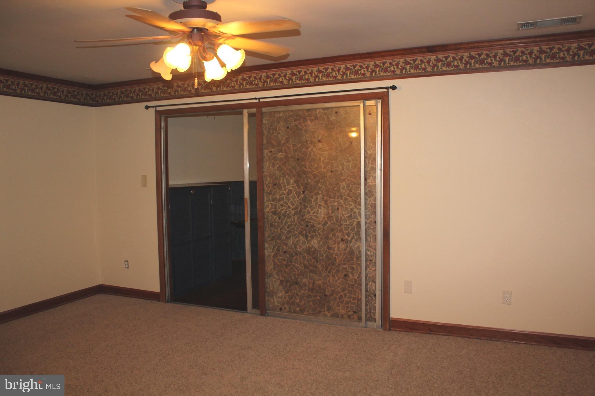 157 Dunlap Road Pasadena, MD 21122 - Photo 9 of 29 Living Room w/Sliders to Family Room
