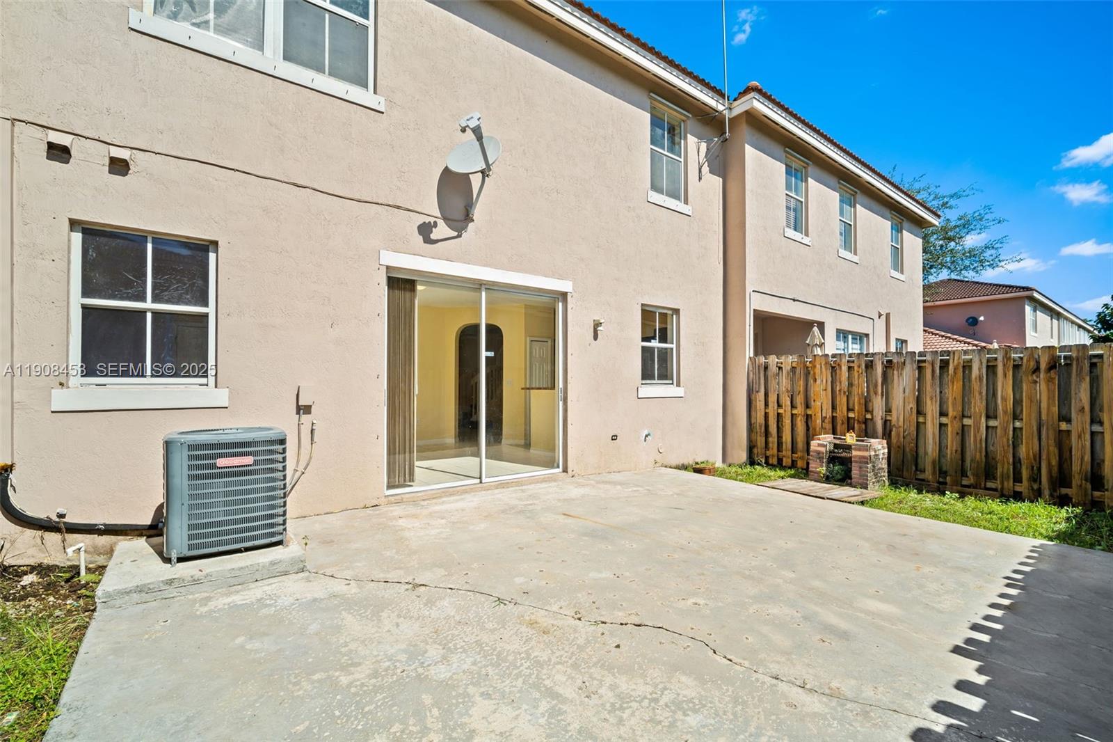 13834 Southwest 274th Terrace Homestead, FL 33032 - Photo 26 of 26 a view of an house with backyard and porch