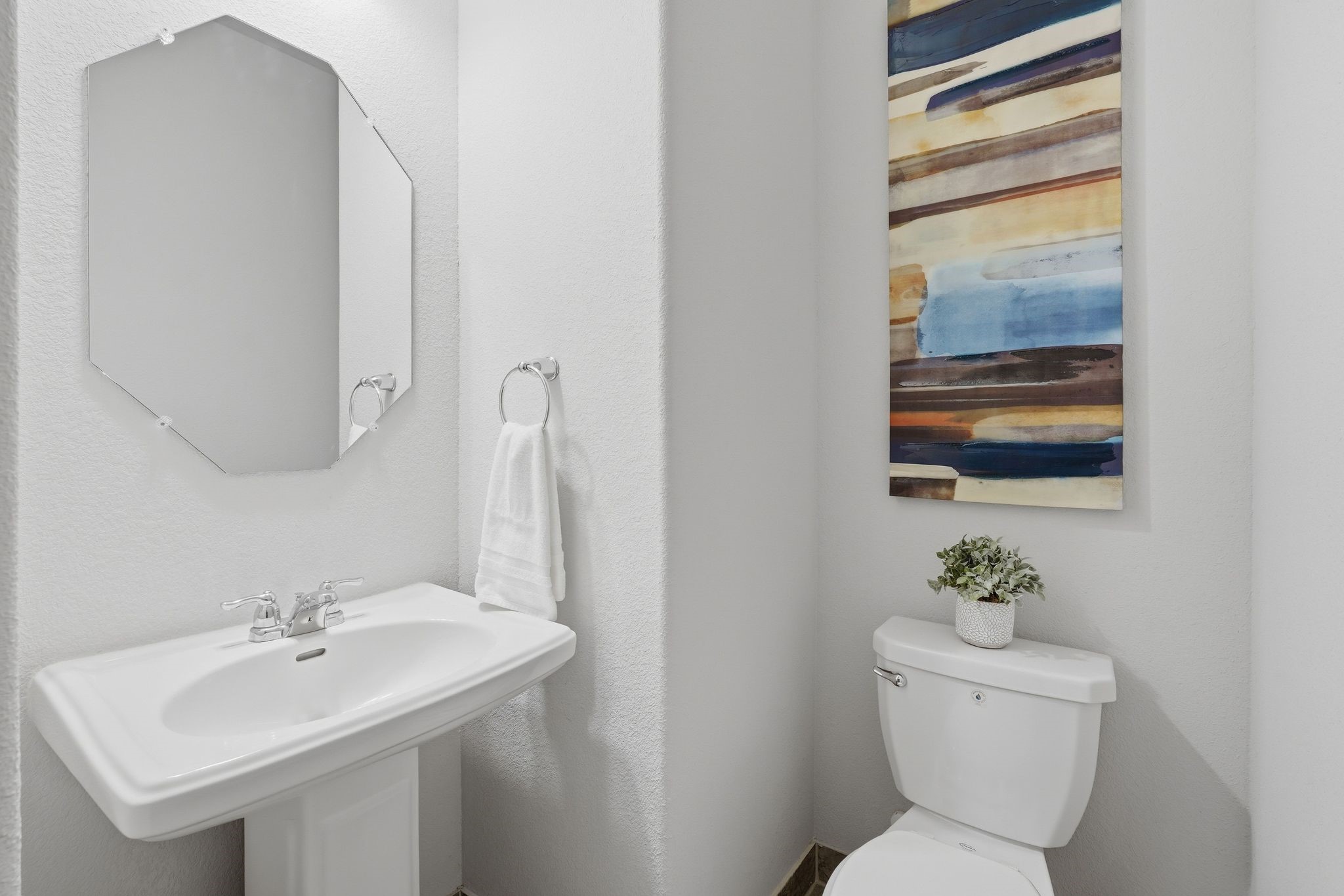 7522 Windsor View Drive Spring, TX 77379 - Photo 31 of 49 Bathroom with pedestal sink, modern fixtures, neutral colors, and stylish decorative accents.