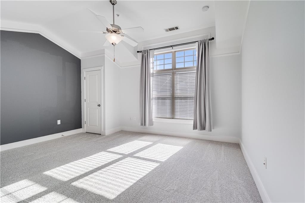 216 Semel Circle Northwest, Unit 355 Atlanta, GA 30309 - Photo 21 of 48 a view of an empty room with a window