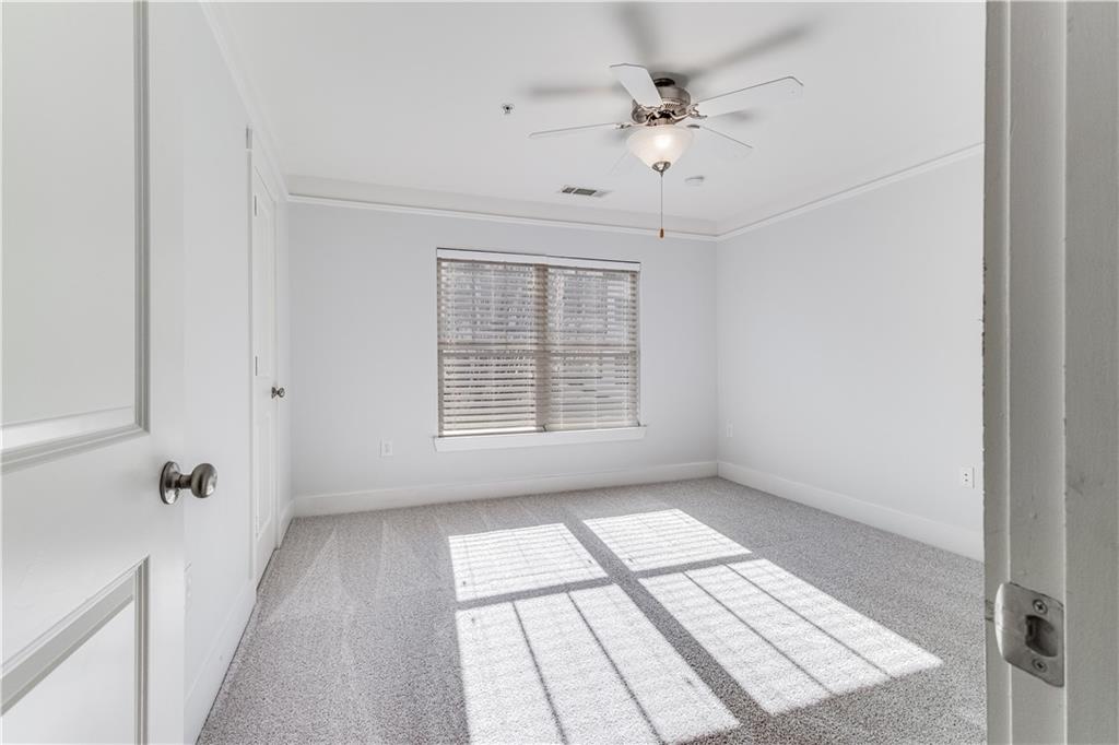 216 Semel Circle Northwest, Unit 355 Atlanta, GA 30309 - Photo 26 of 48 a view of an empty room with a window