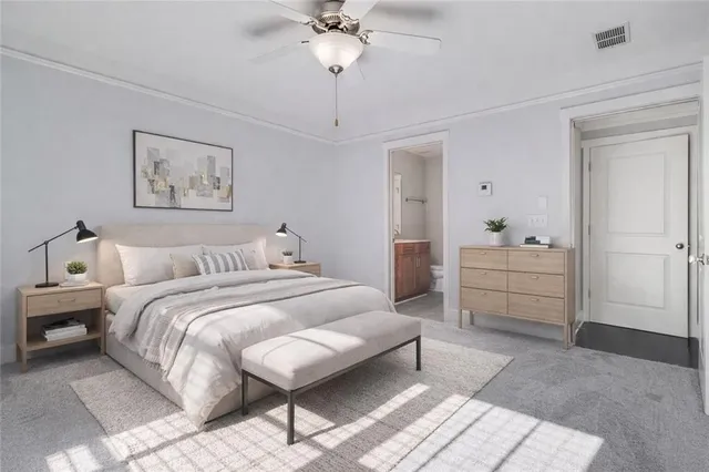 a spacious bedroom with a bed and a chandelier