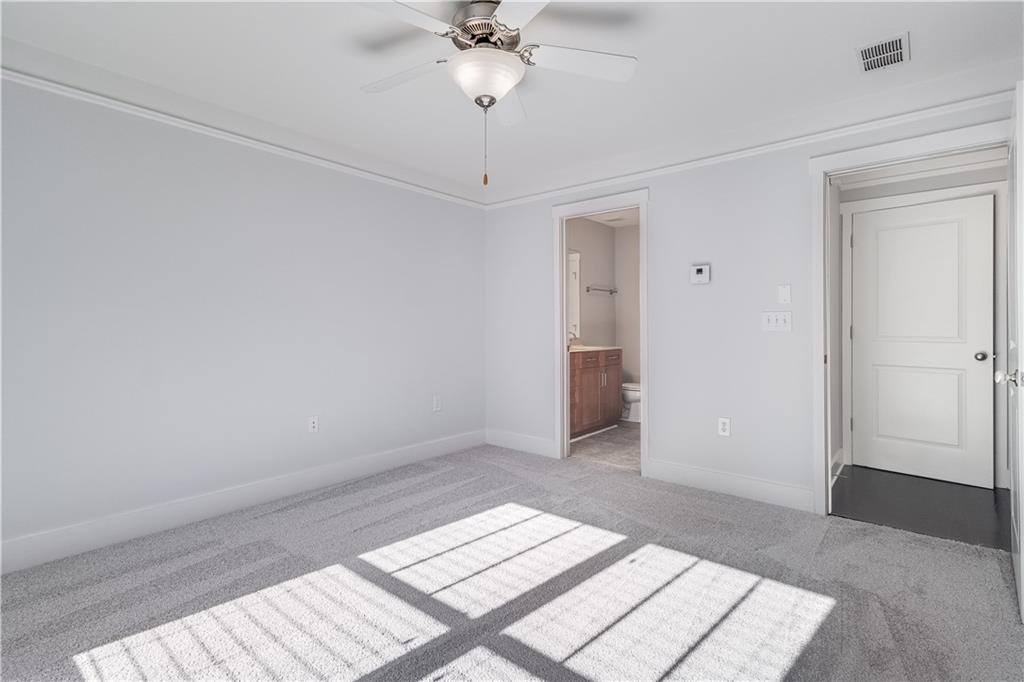 216 Semel Circle Northwest, Unit 355 Atlanta, GA 30309 - Photo 28 of 48 a view of an empty room with a window