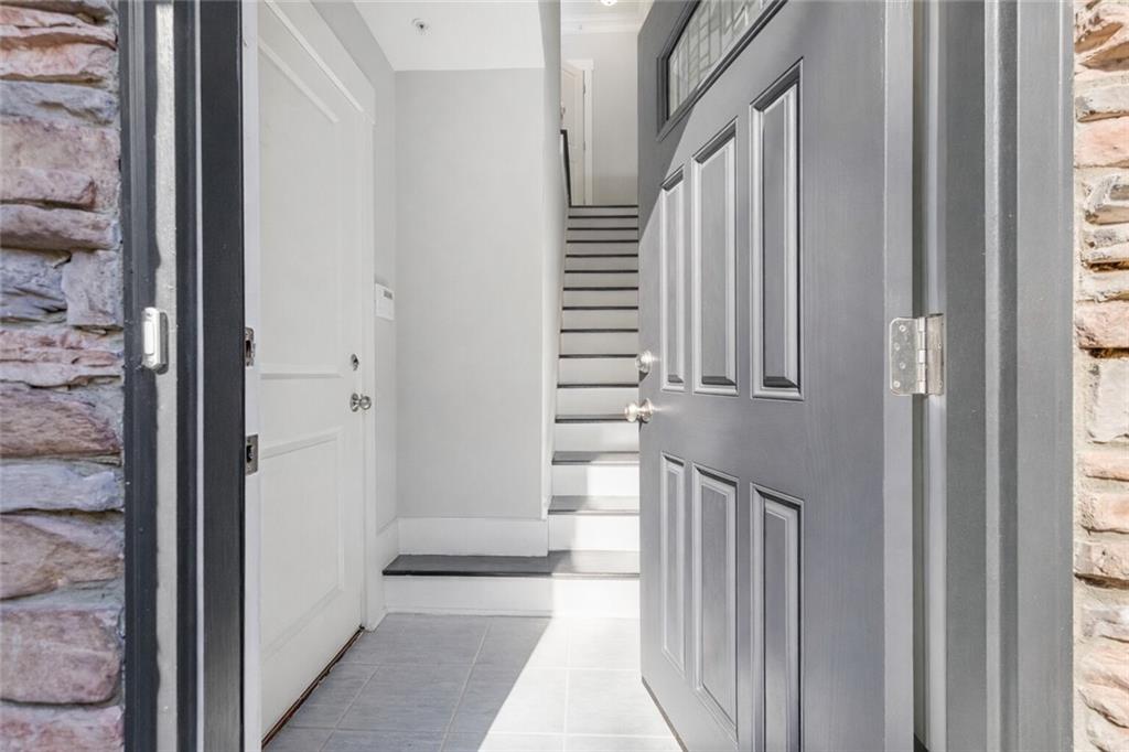 216 Semel Circle Northwest, Unit 355 Atlanta, GA 30309 - Photo 32 of 48 a view of a stairs and an entryway