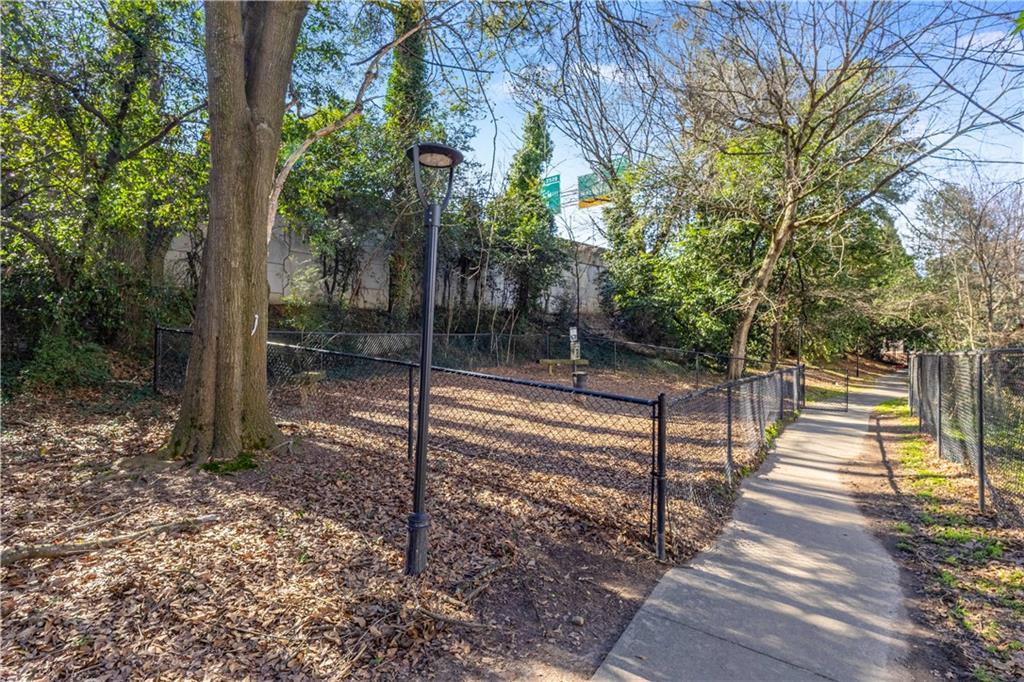 216 Semel Circle Northwest, Unit 355 Atlanta, GA 30309 - Photo 38 of 48 a view of a pathway with a yard