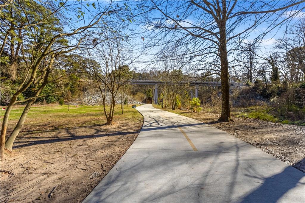 216 Semel Circle Northwest, Unit 355 Atlanta, GA 30309 - Photo 42 of 48 a view of a yard with large trees