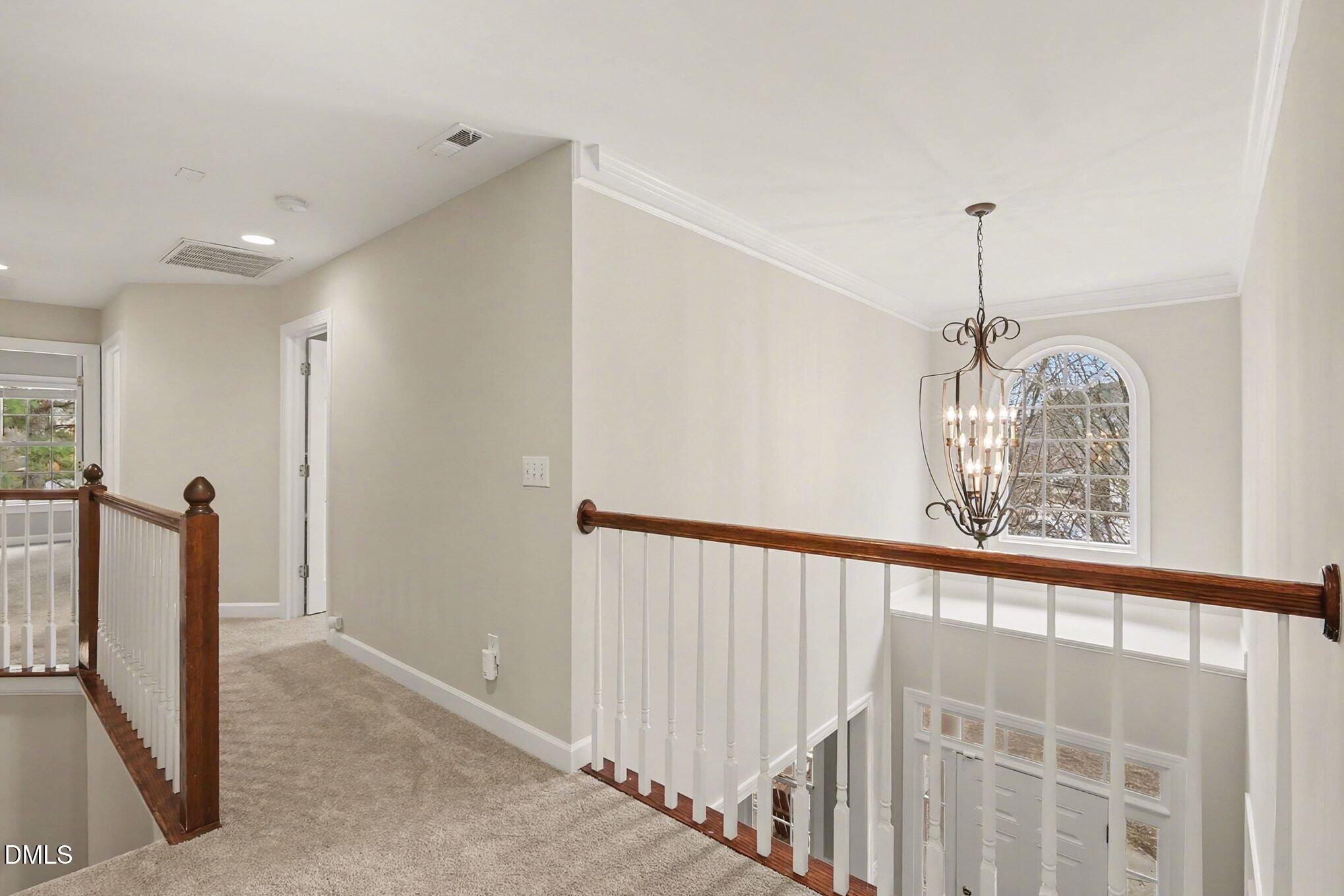 6101 Tiffield Way Wake Forest, NC 27587 - Photo 24 of 40 a view of entryway with wooden floor