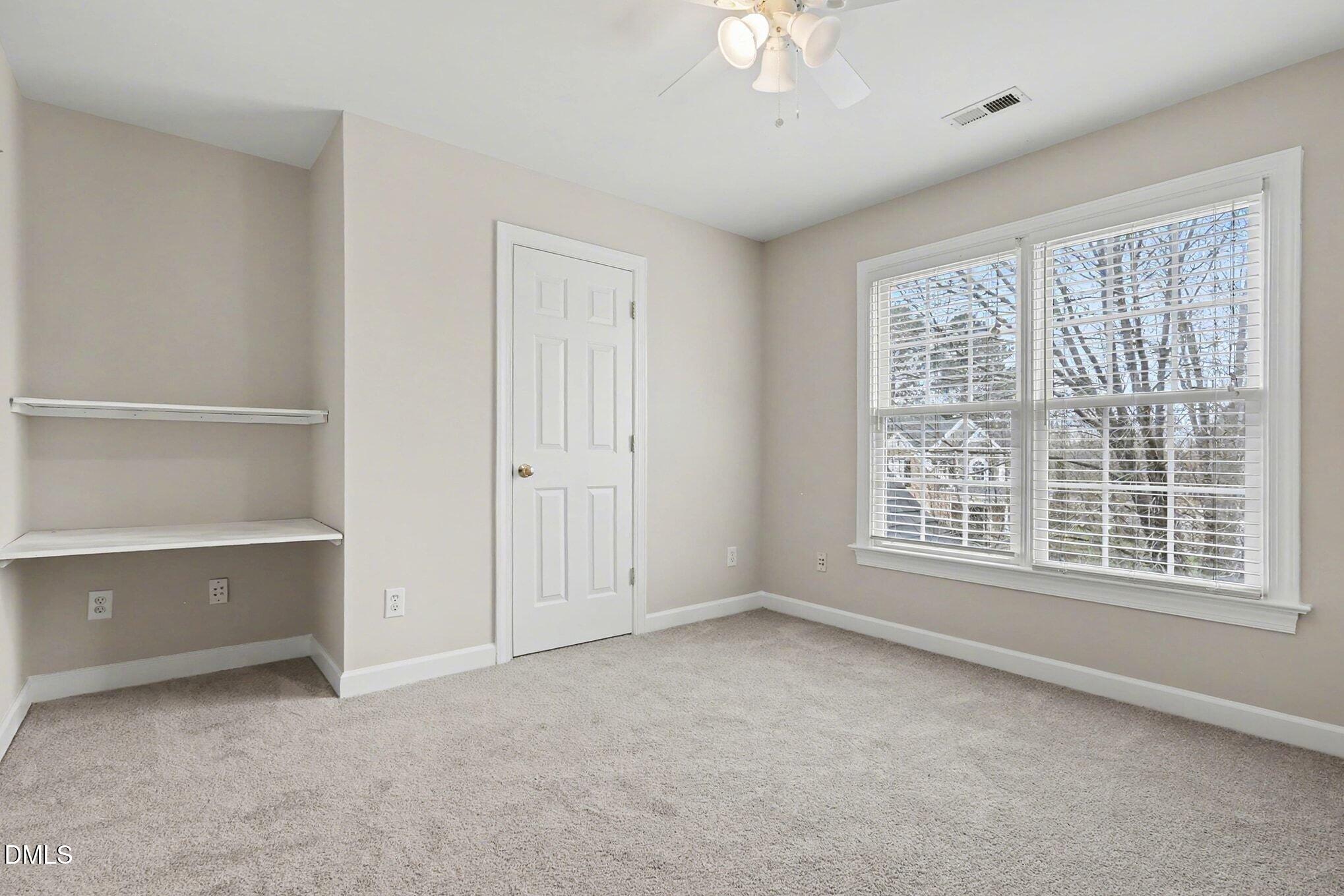 6101 Tiffield Way Wake Forest, NC 27587 - Photo 25 of 40 a view of an empty room with a window