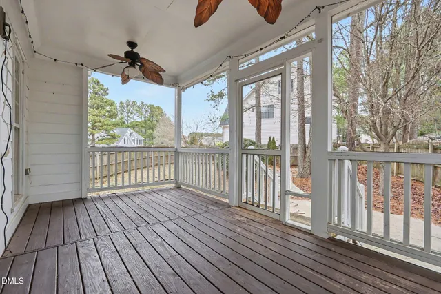 a view of porch with wooden floor