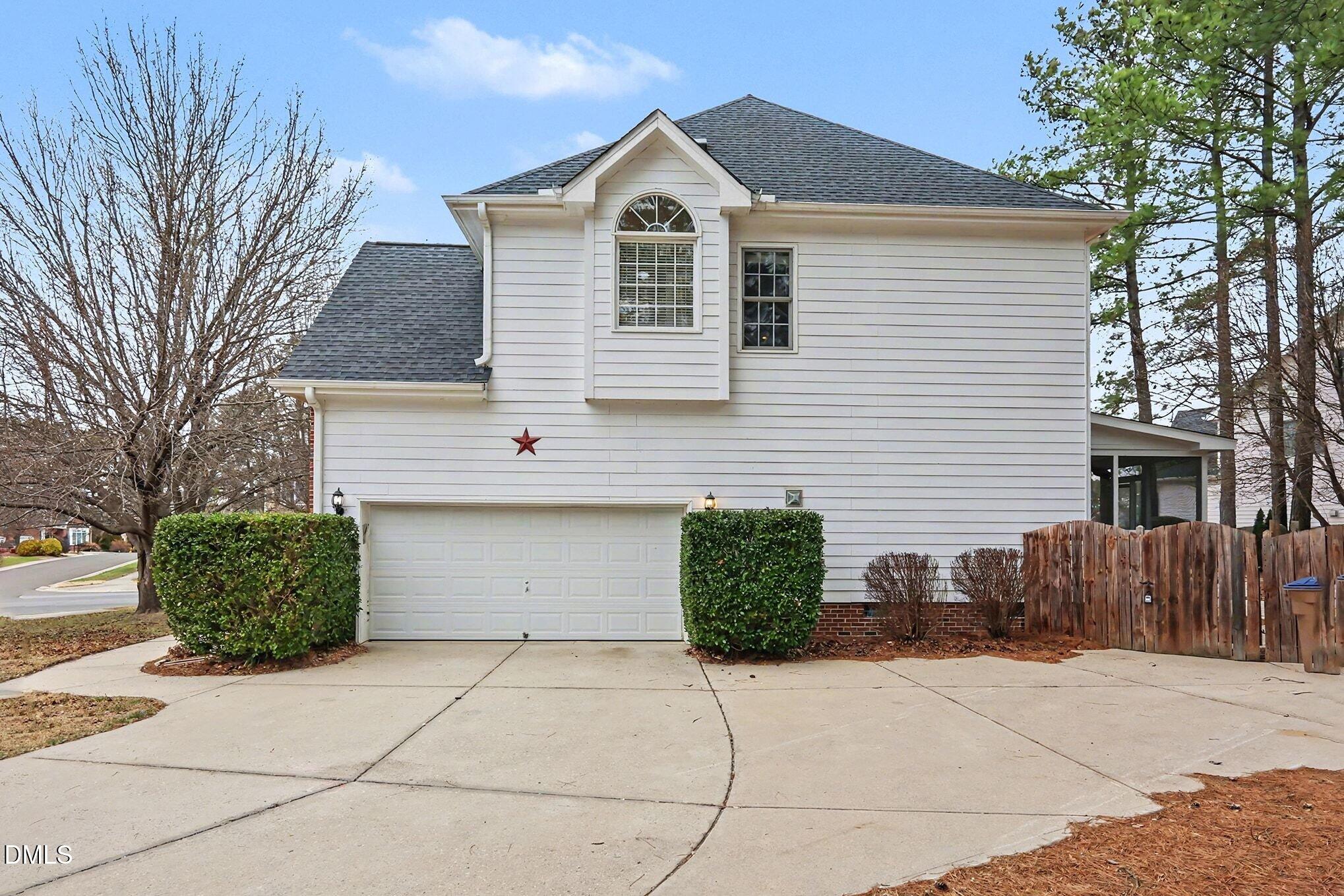 6101 Tiffield Way Wake Forest, NC 27587 - Photo 32 of 40 a front view of a house with garden