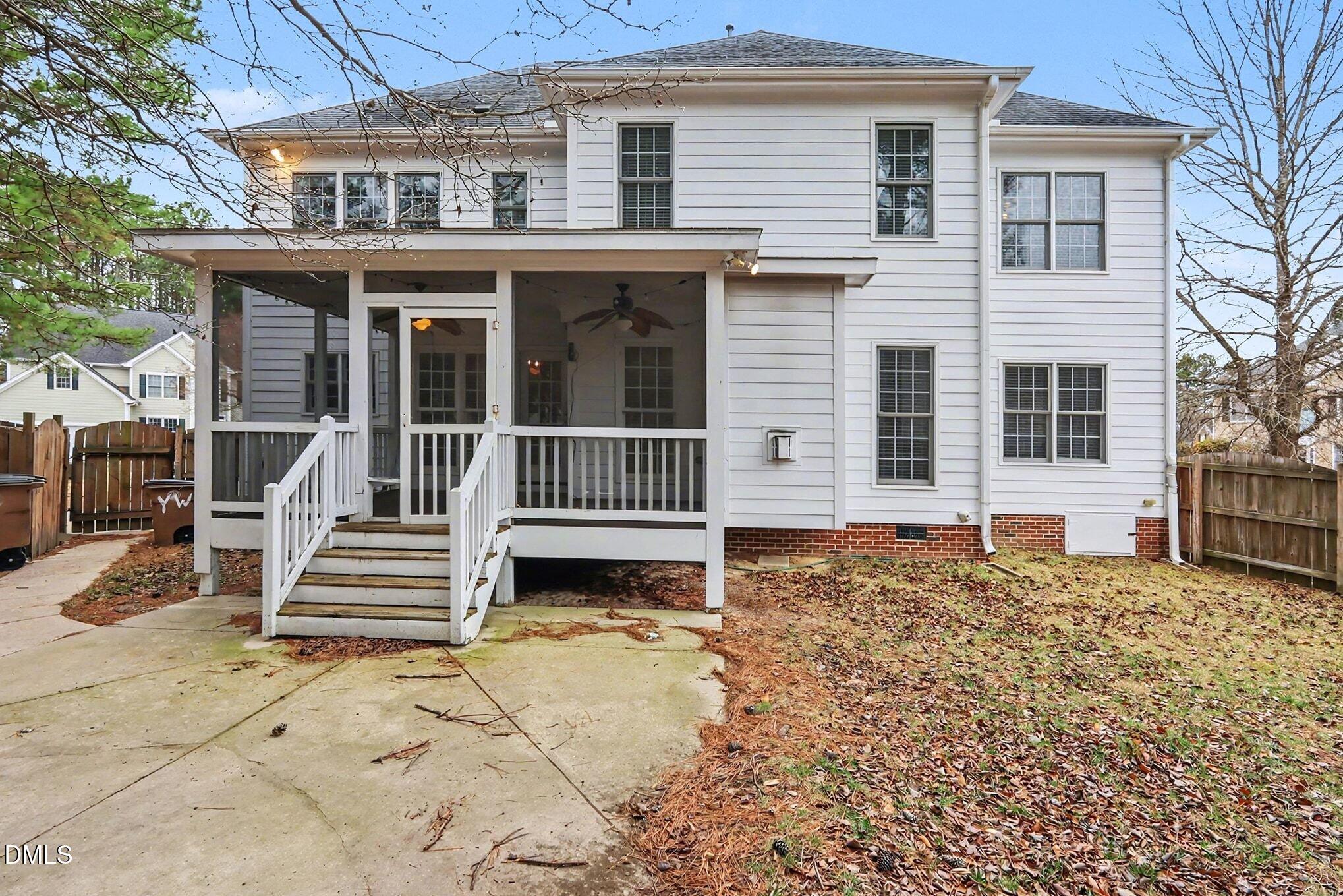 6101 Tiffield Way Wake Forest, NC 27587 - Photo 35 of 40 a front view of a house with a garden