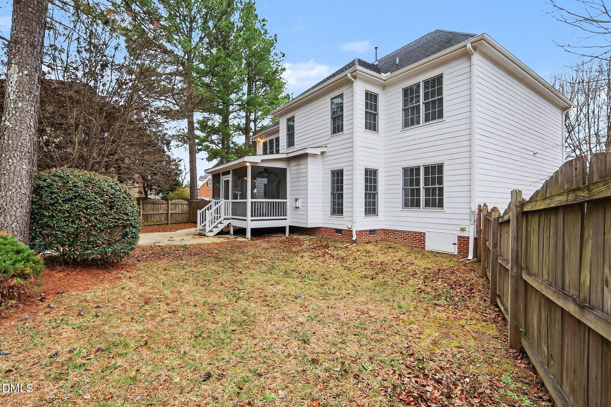 6101 Tiffield Way Wake Forest, NC 27587 - Photo 37 of 40 a view of a house with wooden fence