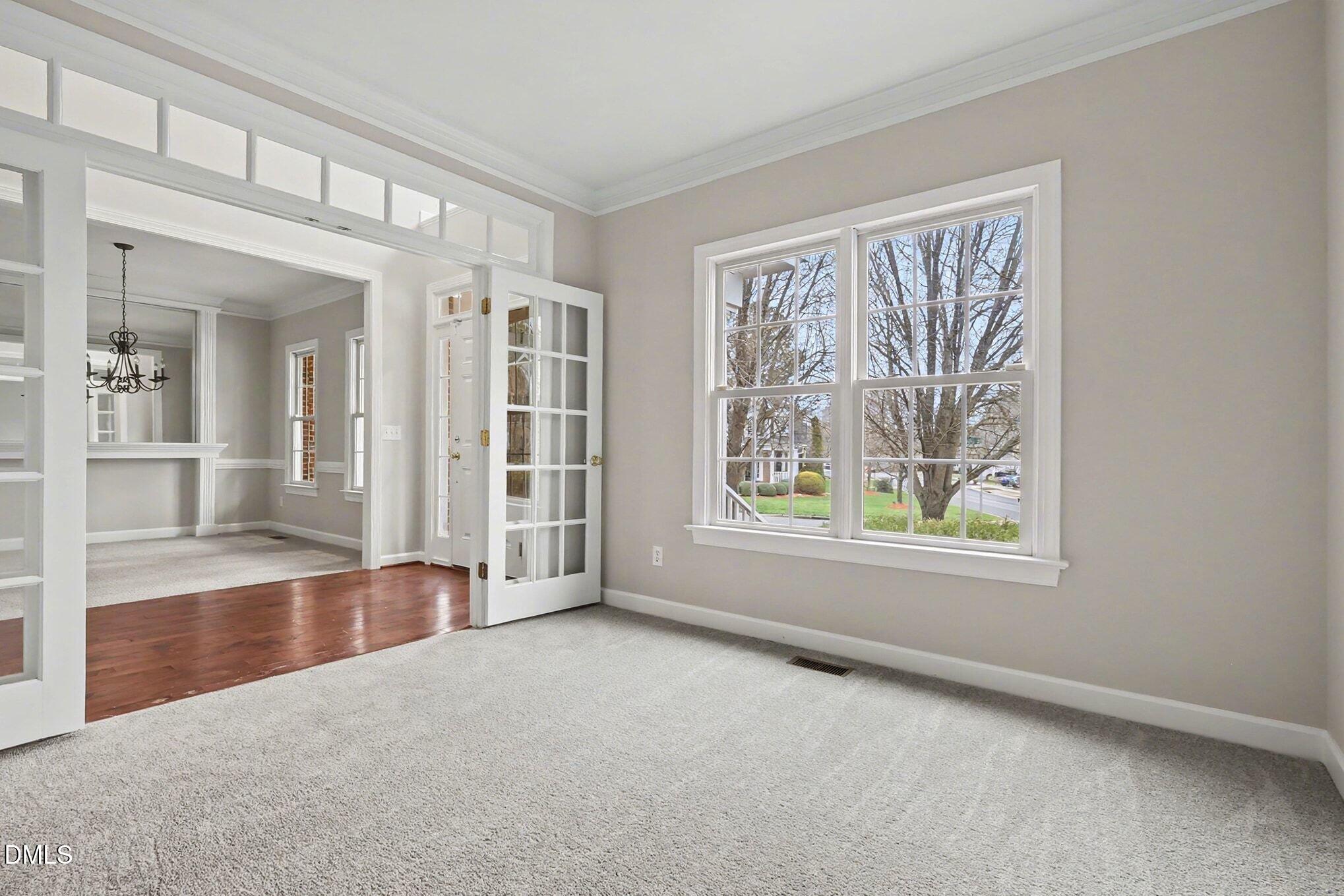 6101 Tiffield Way Wake Forest, NC 27587 - Photo 7 of 40 an empty room with windows and closet
