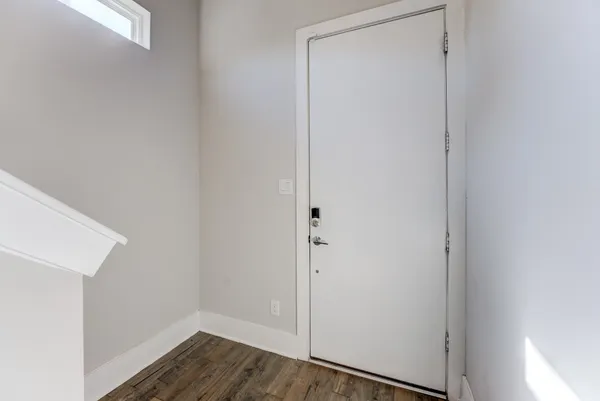 a view of small space with wooden floor