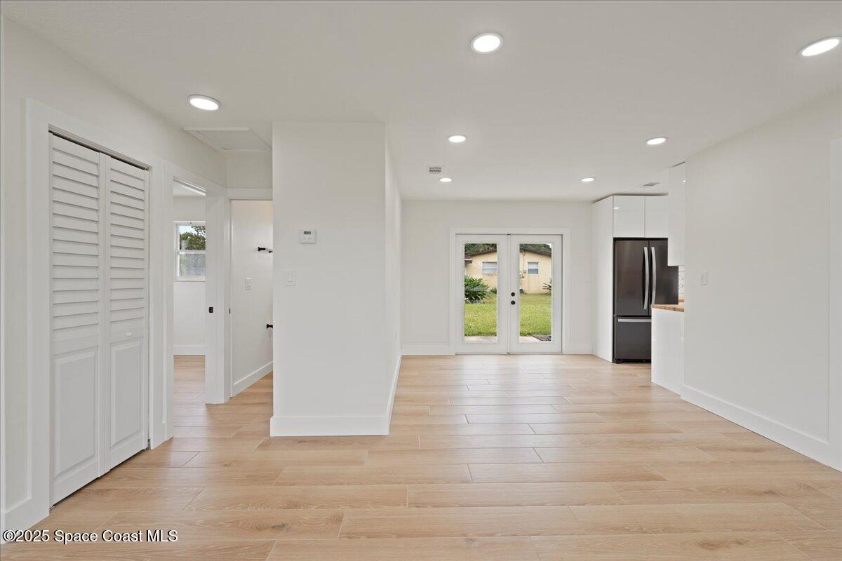 301 West Rutgers Street Melbourne, FL 32901 - Photo 16 of 36 a view of an empty room with wooden floor