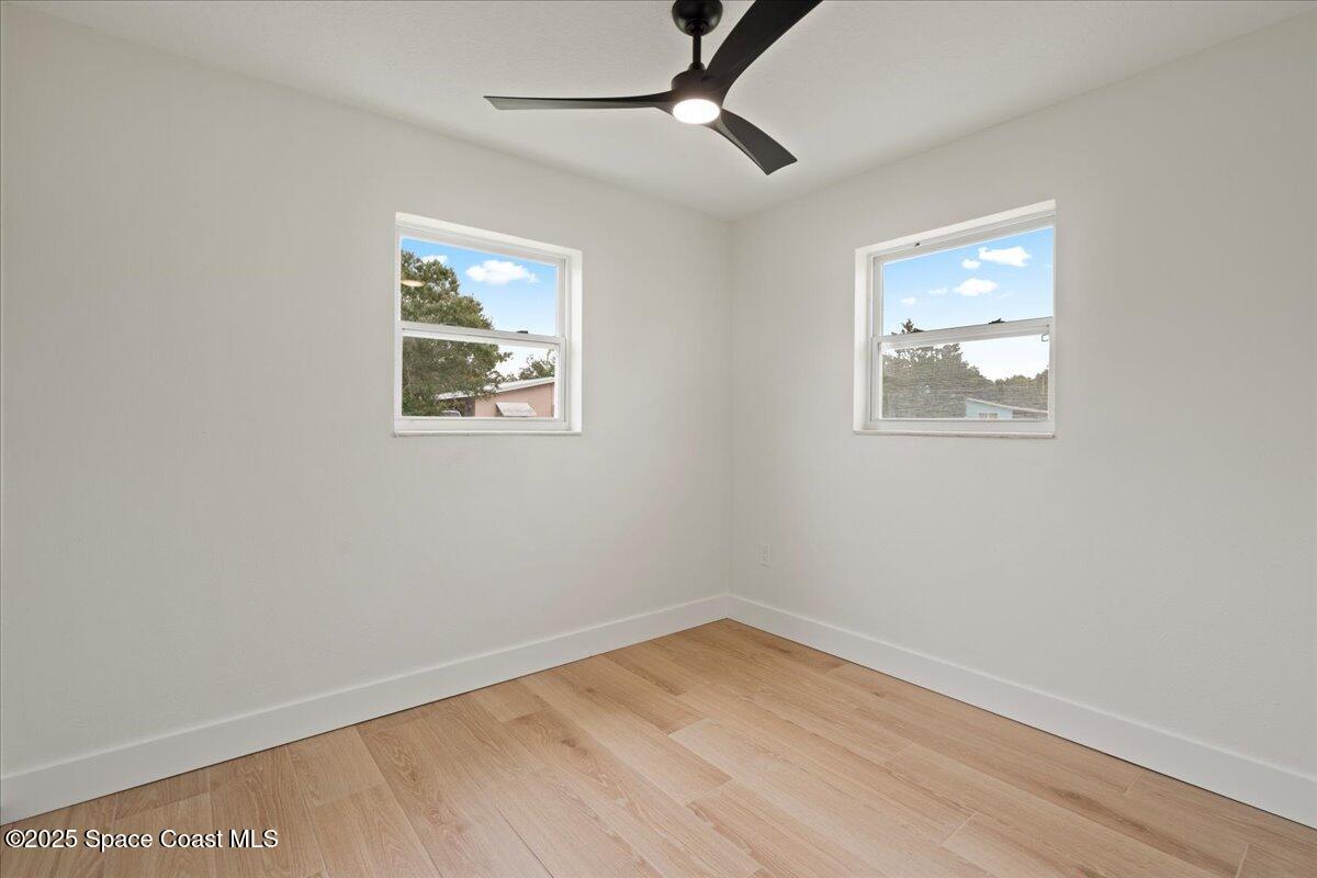 301 West Rutgers Street Melbourne, FL 32901 - Photo 17 of 36 an empty room with a window