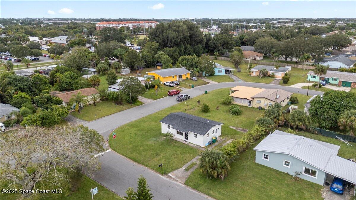 301 West Rutgers Street Melbourne, FL 32901 - Photo 32 of 36 an aerial view of a house with a garden