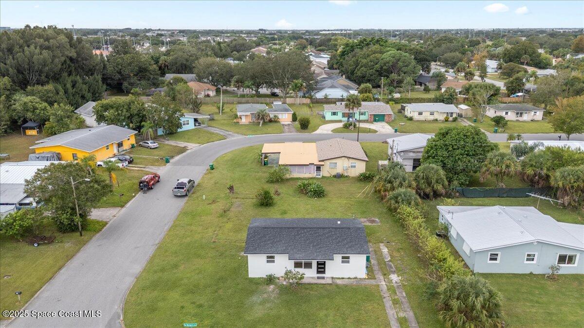 301 West Rutgers Street Melbourne, FL 32901 - Photo 33 of 36 an aerial view of a house with a garden