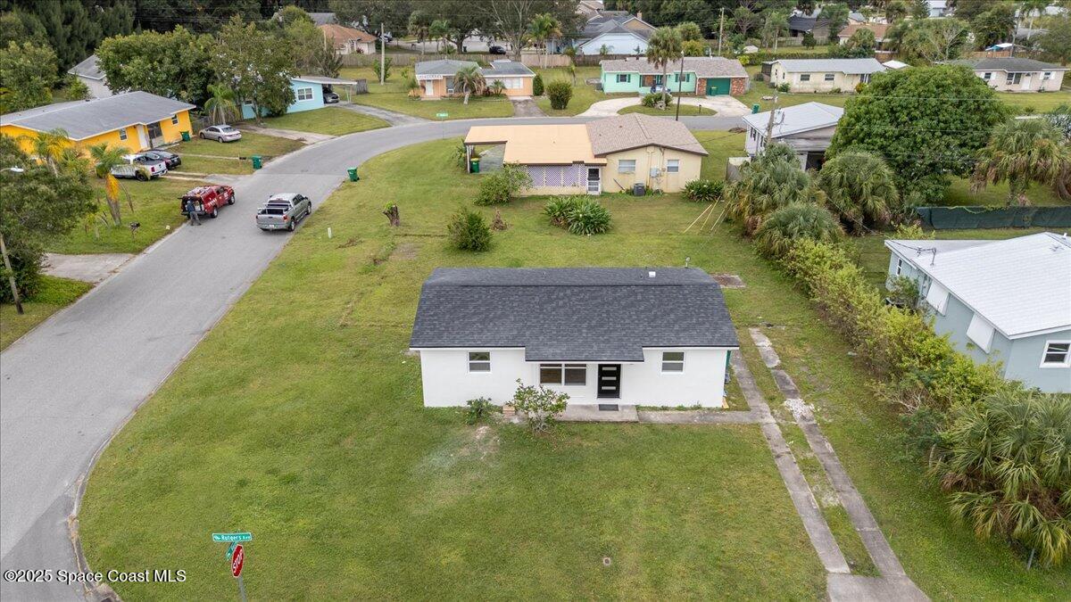 301 West Rutgers Street Melbourne, FL 32901 - Photo 34 of 36 a aerial view of a house with a garden