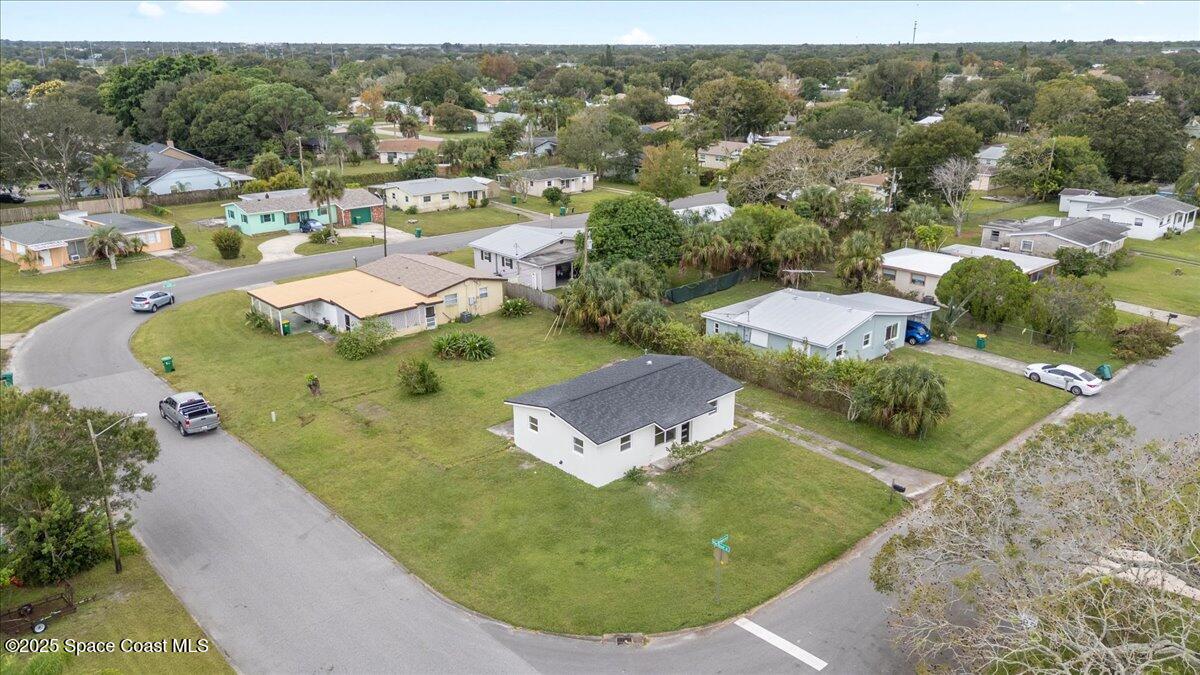 301 West Rutgers Street Melbourne, FL 32901 - Photo 35 of 36 an aerial view of residential houses with outdoor space