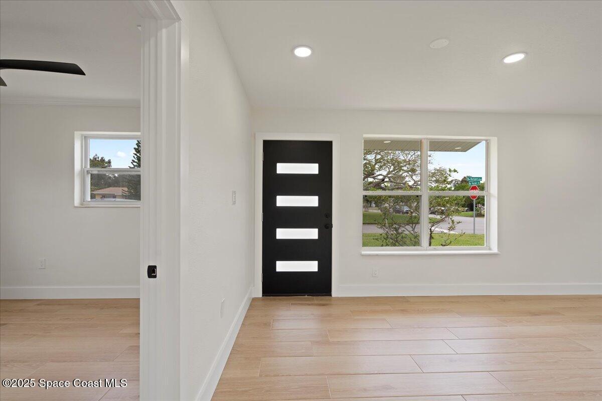 301 West Rutgers Street Melbourne, FL 32901 - Photo 6 of 36 a view of an empty room with a window