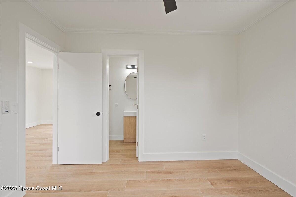 301 West Rutgers Street Melbourne, FL 32901 - Photo 8 of 36 a view of a bathroom with a sink