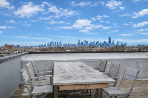 a view of a terrace with sitting area