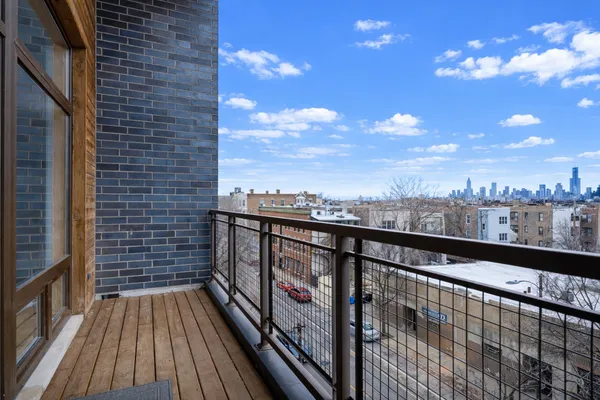 a view of city from a balcony