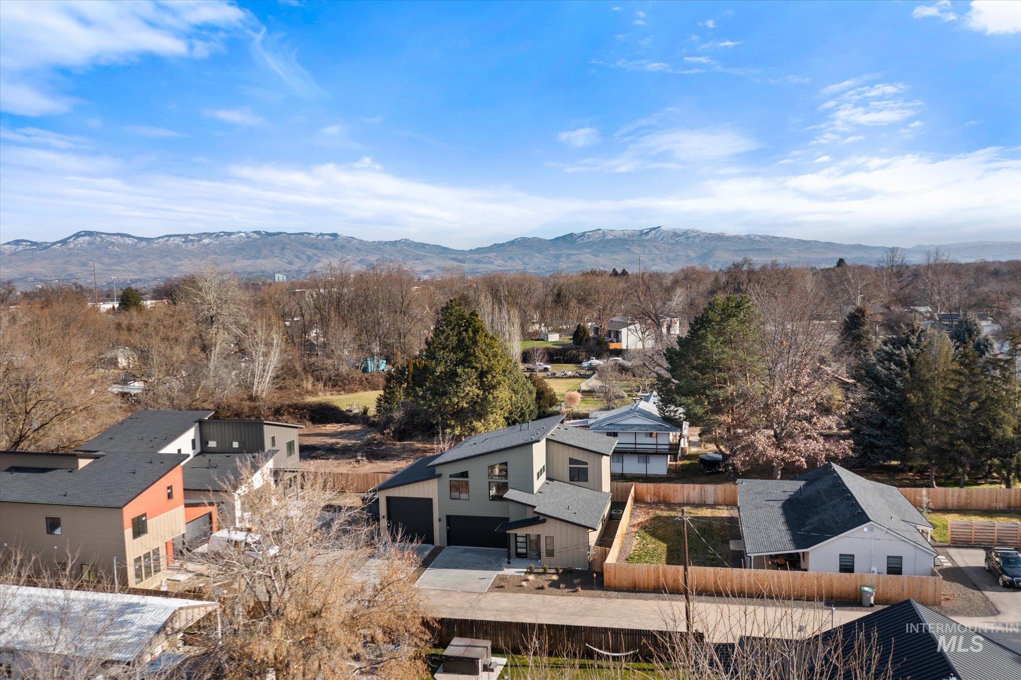 5612 West Grover Street Boise, ID 83705 - Photo 46 of 50 Aerial view of residential area featuring a mountainous background