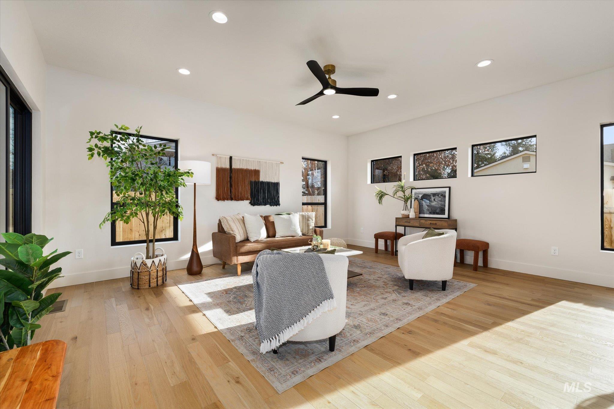 5612 West Grover Street Boise, ID 83705 - Photo 10 of 50 Living room featuring light wood finished floors, recessed lighting, and ceiling fan