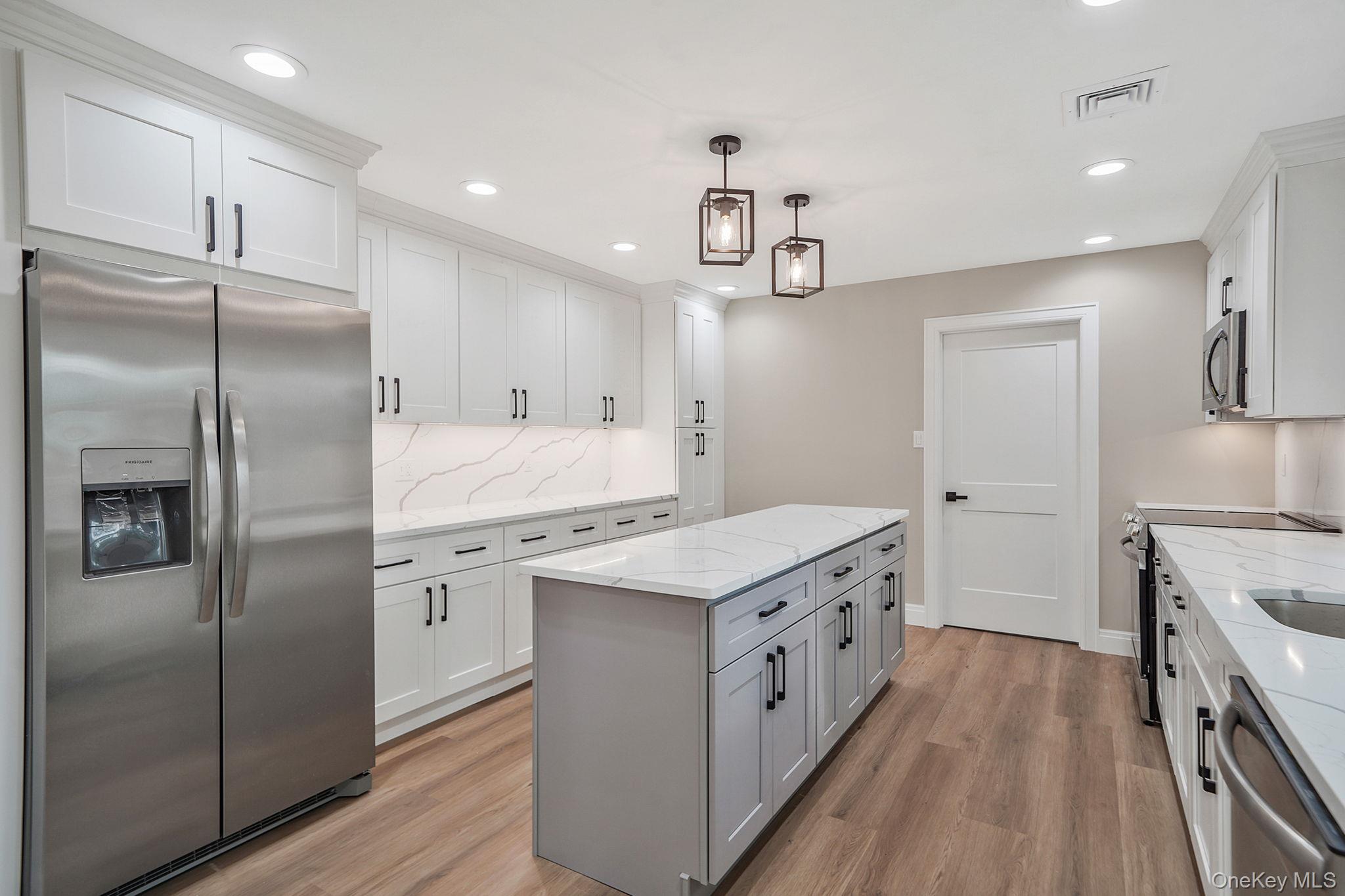 41 Winside Lane Coram, NY 11727 - Photo 10 of 33 Designer Kitchen with center Island